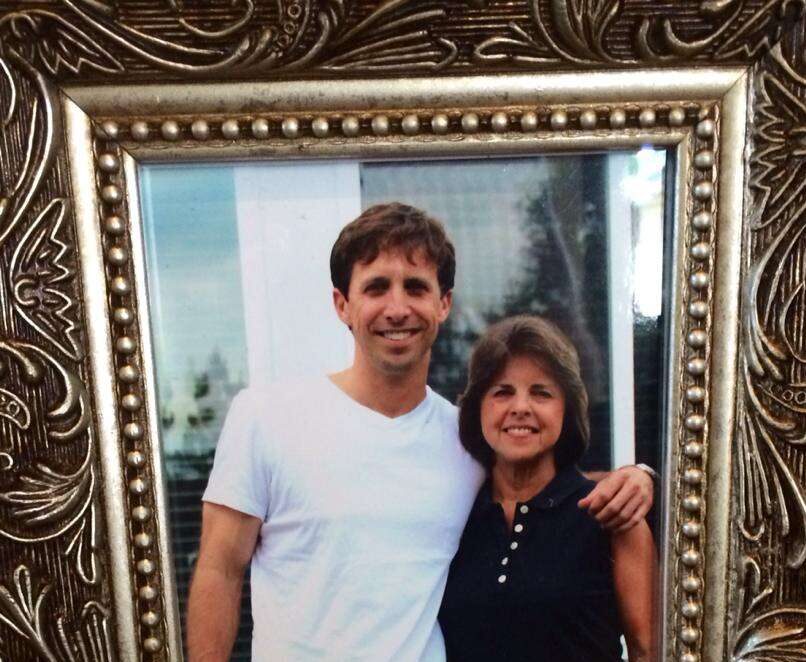 a framed image of 2 people hugging